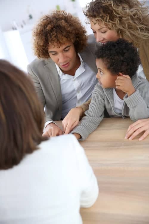 Photo of family in counselling session